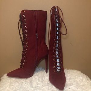 Lace up high heel boots